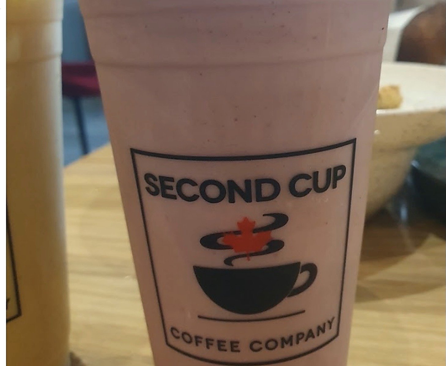 Second Cup Coffee Company branded cup holding a chilled shake
